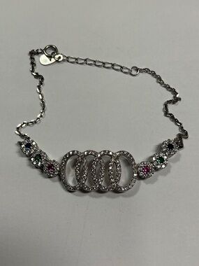 Sterling Silver Bracelet with clear and colored stones. 7 to 8 inches long